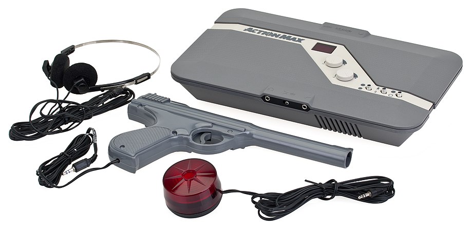 The Action Max system with headphones, light gun, and red light.