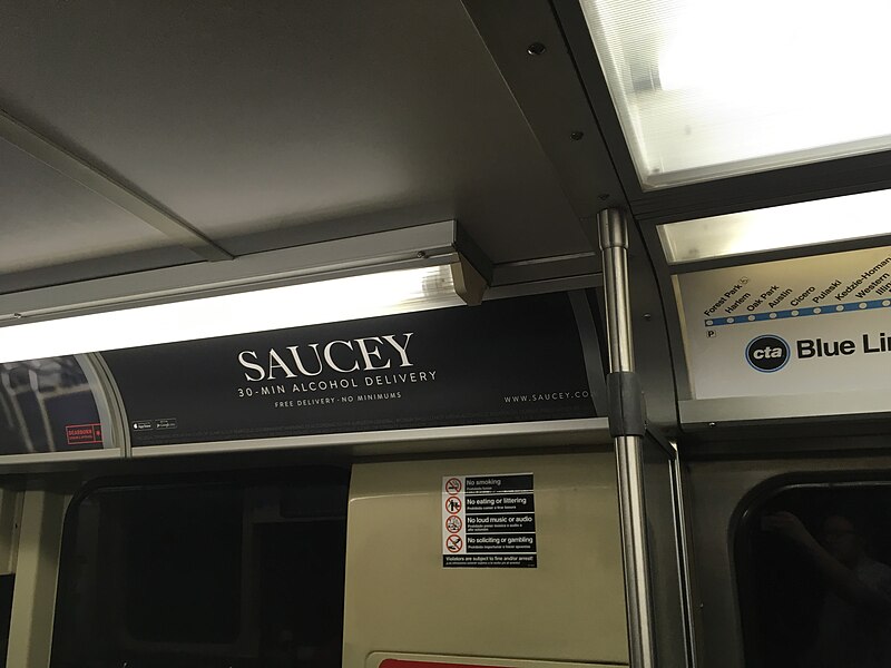 File:Alcohol delivery ad on train (24529492268).jpg