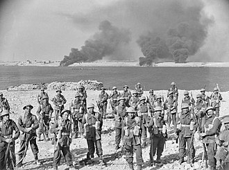 The Australian 2/11th Infantry Battalion regroups on the escarpment at the south side of Tobruk harbour, after penetrating the Italian outer defences and attacking anti-aircraft positions, 22 January 1941. Awm 005392 2nd11th.jpg