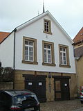 Syringe house with children's school, residential building