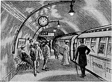 Passengers wait to board a tube train in 1906. Baker Street Waterloo Railway platform March 1906 (cropped).jpg