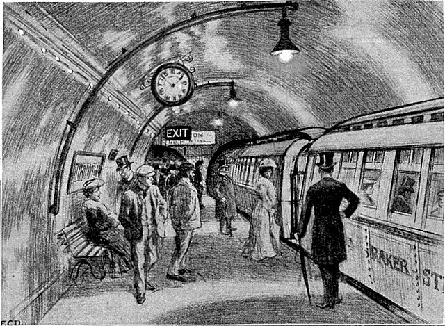 Passengers wait to board a tube train in 1906.