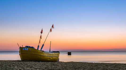 Rewal beach during sunset. Special Area of Conservation "Trzebiatowsko-Kołobrzeski Pas Nadmorski".