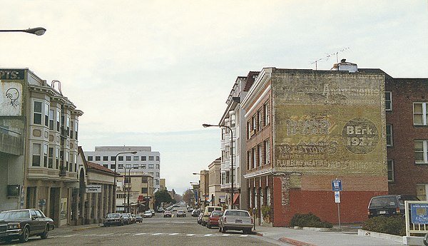 Addison Street, between Oxford Street and Shattuck Avenue, in 1994. The historic Studio Building is the second building on the right.