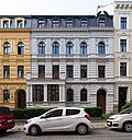 Apartment building in closed development with front garden