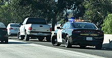 A California Highway Patrol traffic unit conducting a traffic stop California Highway Patrol Dodge Charger conducting traffic stop.jpg