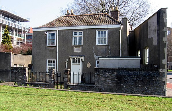 The wall at the right of the house where Chatterton was raised is that of the c. 1739 school where Chatterton's father was master. The school was demo