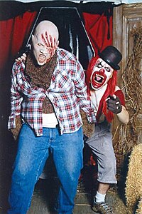 Two street monsters posing by the Ghost Town Coffin. Clowncrew13.jpg