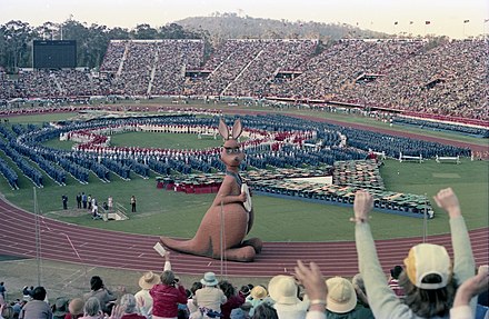 Performers making a map of Australia (excluding Tasmania) during the 1982 Commonwealth Games opening ceremony.