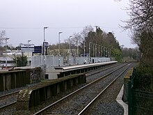 Platform 2 at Derriaghy was replaced by a new structure across the Queensway road. This photo was taken on Saturday 23 March 2024, and the platform opened on Monday 25 March 2024.
Platform 1 at Derriaghy was extended to cater for 6-carriage trains. This photo was taken on Saturday 23rd March 2024. Derriaghy Platform 2.jpg