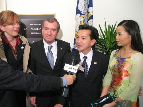 California Congressman Ed Royce and his wife welcoming newly elected Congressman Joseph Cao and his wife outside Cao's office