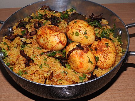 Egg masala biryani; biryani is popular in Pakistan, Bangladesh, the Muslim community in India and the diaspora.