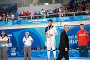 Deutsch: Fechten bei den Olympischen Jugend-Sommerspielen 2018: Tag 1, 7. Oktober 2018, Jungen, Säbel, Siegerehrung - Gold: Krisztián Rabb (HUN), Silber: Hyun Jun (KOR), Bronze: Mazen Elaraby (EGY); Medaillen überreicht durch IOC-Mitglied Britta Heidemann, Maskottchen überreicht durch FIE-Generalsekretär Emmanuel Katsiadakis English: Fencing at the 2018 Summer Youth Olympics at 7 October 2018 – Boys' sabre Medal ceremony – Gold: Krisztián Rabb (HUN), Silver: Hyun Jun (KOR), Bronze: Mazen Elaraby (EGY); Medal presenter: IOC member Britta Heidemann, Mascot presenter: FIE Secretary General Emmanuel Katsiadakis