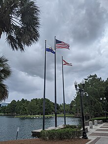 The flag of Orlando at Lake Eola alongside the flags of the United States and Florida Flag of Orlando at Lake Eola.jpg