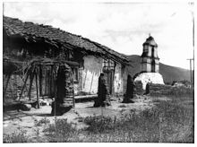 Pala Mission around 1903, falling into ruins General view of Mission Asistencia of San Antonio at Pala, California, showing the chapel and bell tower from the north, ca.1903 (CHS-731).jpg