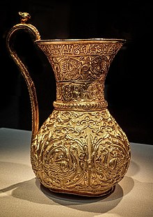 Gold ewer of the Buyid Period, mentioning Buyid ruler Izz al-Dawla Bakhtiyar ibn Mu'izz al-Dawla, 966-977 CE, Iran. Gold Ewer Iran Buyid Period Third quarter of 10th century CE (cleaned up).jpg