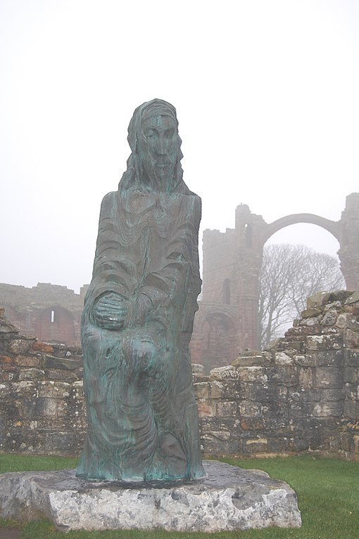 A stylised statue of St Cuthbert at Lindisfarne Priory.