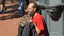 Male transient in Portland, Oregon, in 2016 Homeless man in Portland, Oregon.jpg