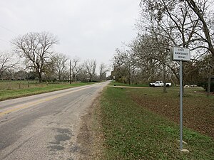 Start of FM 1161 at Boone's Bend Road east of Hungerford. View is west.