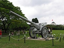 The Japanese field-artillery gun on display on the Istana grounds. Istana 18, Singapore, Jan 06.JPG