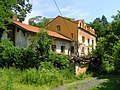 Opuštěný mlýn v části Olešovice