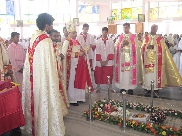 An Eastern Catholic bishop of the Syro-Malabar Church holding the Mar Thoma Cross which symbolizes the heritage and identity of the Saint Thomas Chris