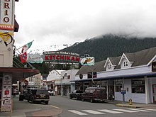 Ketchikan sign, which arches over Mission Street. Front Street is in the immediate foreground.