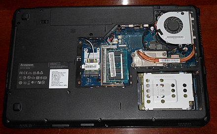 Opened bottom covers allow replacement of RAM and storage modules (Lenovo G555)