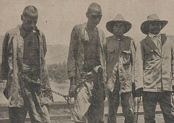 Lumbia (on left) following his arrest in 1926 Lumbia (on left) following his arrest in 1926.jpg