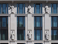 Figures at the facade of the Burgplatz-Passage in Leipzig Lzg. Burgpl. Figuren.jpg