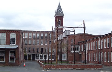 The main entrance to the museum, with the campanile tower on the right (2012) MASS MoCA main entrance.jpg