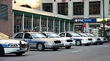 A group of MTAPD vehicles parked together. Notice the various lightbars and colour schemes in use.) MTA Police (6055622013).jpg