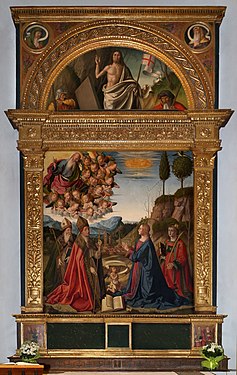 Deux tableaux l'un au-dessus de l'autre au sein d'une structure en bois. Dessus : le Christ bénissant. Dessous : Deux groupes de personnages dont la Vierge en prière et au centre un Jésus bébé