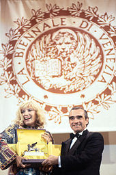Scorsese receives the Golden Lion for Lifetime Achievement from actress Monica Vitti at the Venice Film Festival in 1995 Martin Scorsese 02.jpg