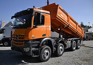 Dump truck Truck which can tip its bed, dumping its contents