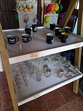 Mugs and glass cups in a gift shop in a zoo in Northeastern Mexico. Mugs and glass cups in a zoos souvenir store.jpg