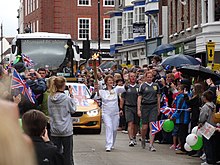 The torch relay in Newport, Isle of Wight Olympic torch relay through Newport.jpg