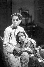 Directed by Bengali language film director Pramathesh Barua, Devdas (1935) pivots a tragic love triangle between Devdas, Paro, and Chandramukhi. P.C. Barua and Jamuna - Bengali version of Devdas (1935).jpg