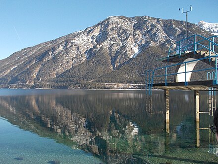 Crystal clear water of Achen Lake with jump facilities at Pertisau Beach