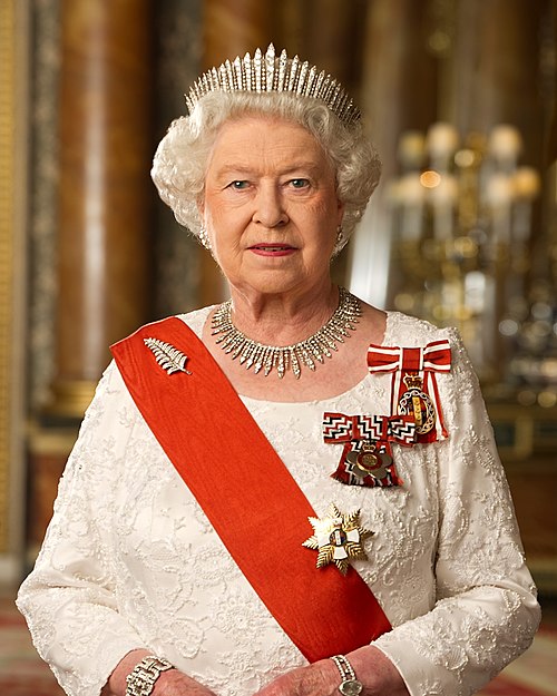 Queen Elizabeth II, the founder of the Order of New Zealand, the New Zealand Order of Merit, and the Queen's Service Order, wearing her insignia as so