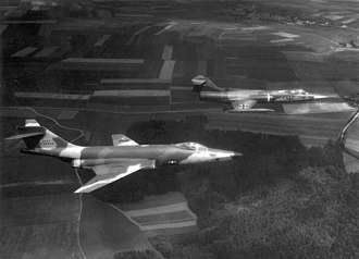 A German RF-104G in flight with a 66th Tactical Reconnaissance Wing McDonnell RF-101C. RF-101C and RF-104G in flight.jpg