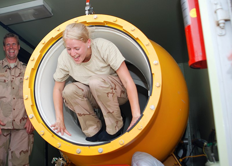 File:Royal Netherlands Navy Cpl. Emmylou Bakker, a diving medical nurse, climbs out of a hyperbaric decompression chamber during a mine diving rescue exercise in support of Mine Countermeasures Exercise (IMCMEX) 2013 130516-N-QS318-006.jpg