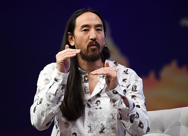 Aoki on stage during day three of Collision conference in 2019