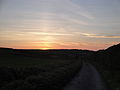 The sun setting at St Rhadagunds Path, Whitwell, Isle of Wight.