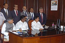 Union Finance Minister giving final touches from his desktop to the General Budget 2006-07. The Union Finance Minister Shri P. Chidambaram giving final touches from his desktop to the General Budget 2006-07, in New Delhi. The Minister of State (Revenue) Shri. S.S. Palanimanickam and the Minister of State (E.jpg