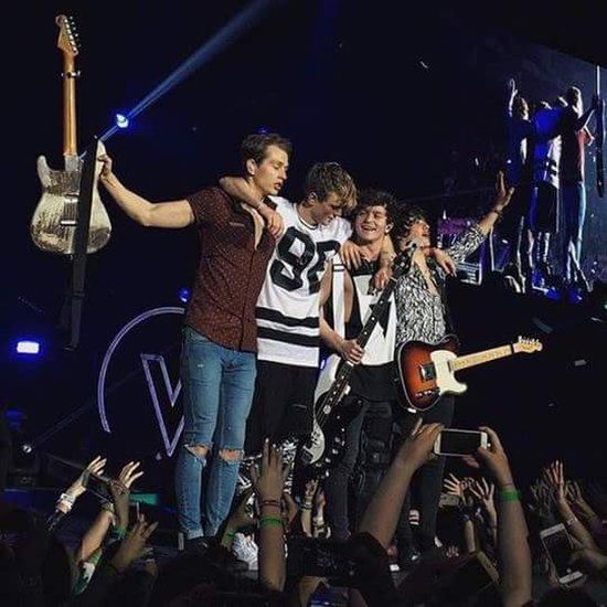 The Vamps performing at the O2 Arena in London during their Wake Up World Tour, in April 2016. (L-R: James Brittain-McVey, Tristan Evans, Connor Ball 