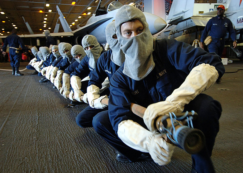 File:US Navy 051031-N-7090S-001 Sailors assigned to Repair Locker One Bravo stand ready to battle a simulated fire.jpg