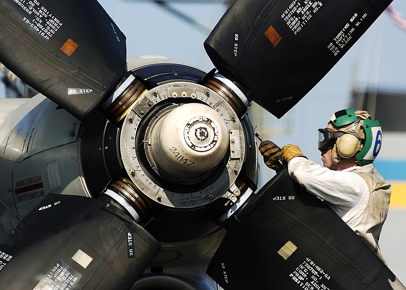 File:US Navy 060403-N-0499M-151 A Sailor performs maintenance to an E-2C Hawkeye.jpg