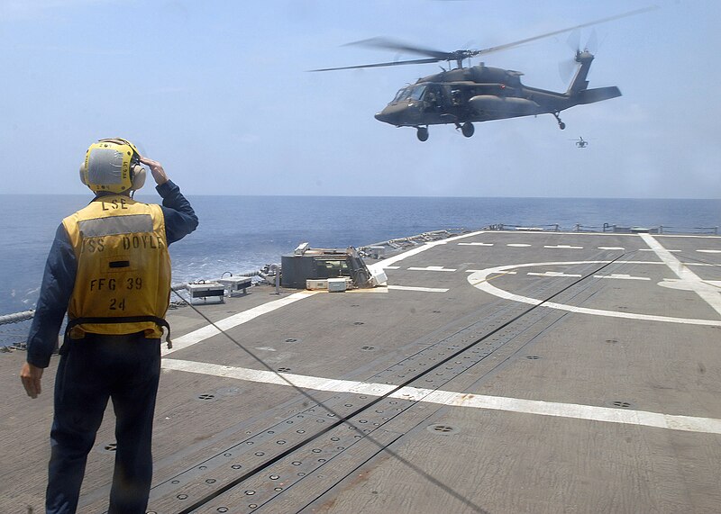 File:US Navy 090525-N-4879G-312 Boatswain's Mate 2nd Class James Patterson salutes an Army UH-60.jpg