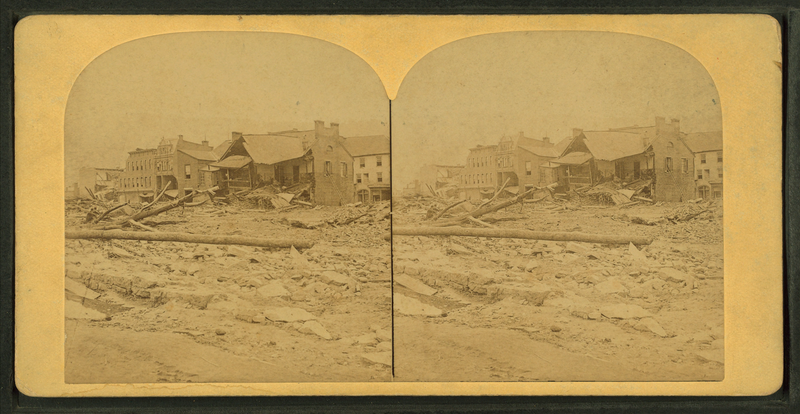 File:View looking toward the corners of Main and Clinton Streets showing remains of the only buildings left standing on the one side of Clinton Street, from Robert N. Dennis collection of stereoscopic views 2.png